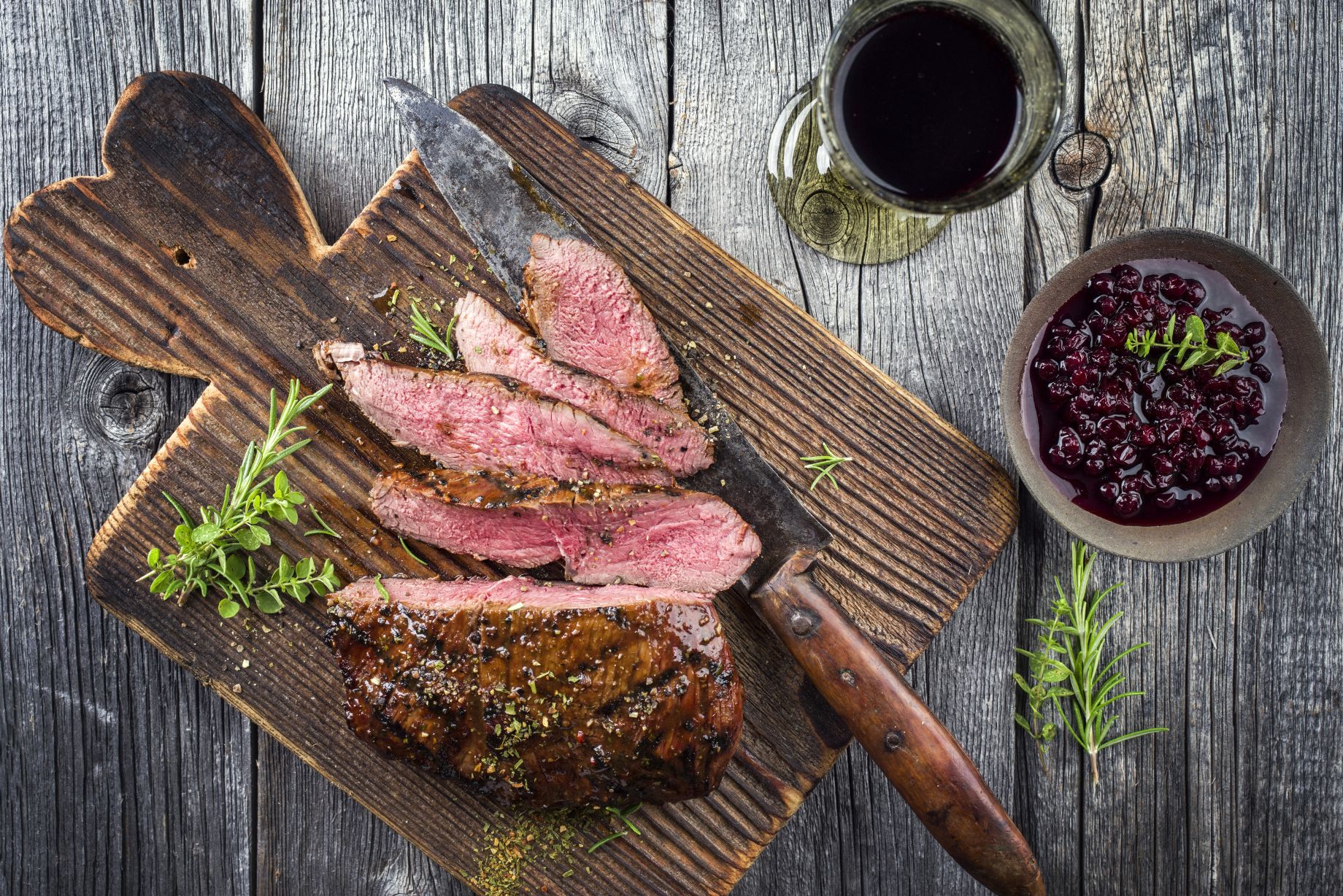 venison steak with bowhunting kill by pro-tracker